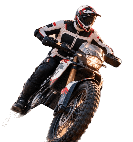 Rider in an armoured textile riding jacket on an adventure motorcycle on a mountain trail